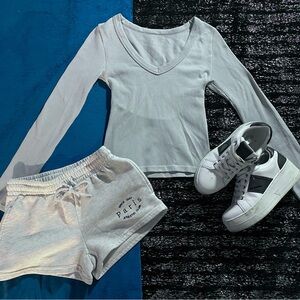 Light blue ribbed long sleeve top with V neckline